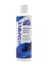 Wet Stuff Vitamin E lubricant, 550g disc top bottle with blue and white label, water-based formula for personal use.