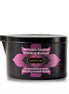 Kama Sutra Island Passion Berry massage candle in a black container with pink floral design, 170g.