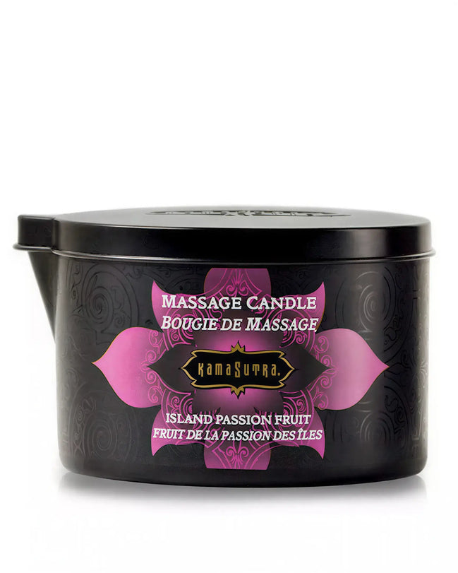 Kama Sutra Island Passion Berry massage candle in a black container with pink floral design, 170g.