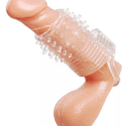 Vibrating textured erection sleeve in flesh tone with raised nodules for stimulation, angled view showcasing details.