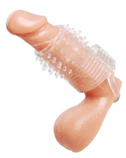 Vibrating textured erection sleeve in flesh tone with raised nodules for stimulation, angled view showcasing details.