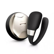 Lelo Tiani 3 vibrator in black with a silver accent, featuring a curved design and a charging base.