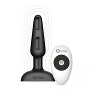 B-Vibe Trio Plug in black with a remote control, featuring a tapered design and textured base.