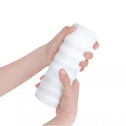 Zolo Twist Anaconda masturbator held in two hands, featuring a textured, white silicone design.