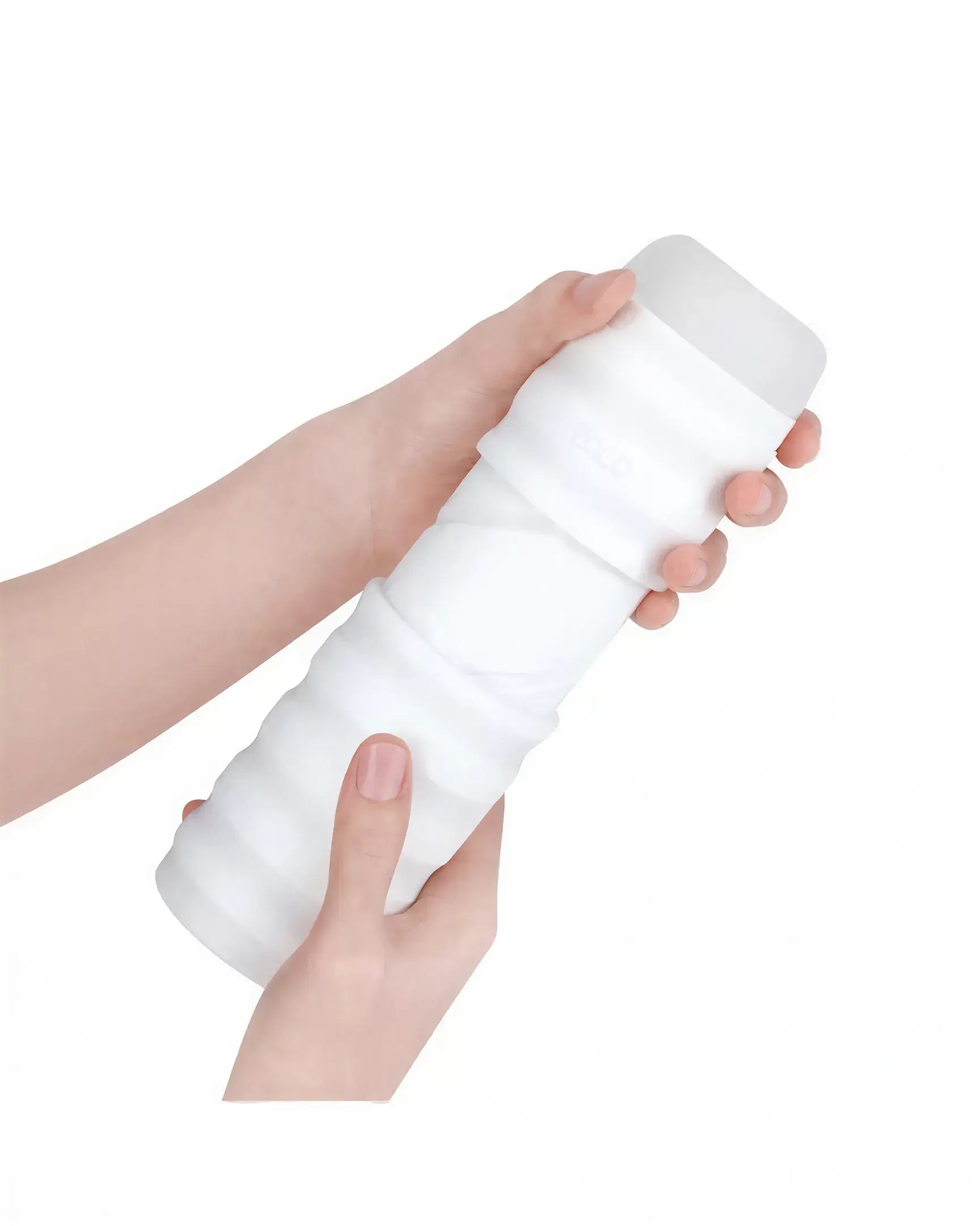 Zolo Twist Cobra masturbator held in hands, featuring a textured white design with a smooth top.