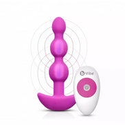 B-Vibe Triplet anal beads in pink with a remote control, featuring three graduated beads and a flared base.