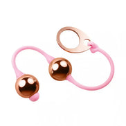 Rocks Off Golden Balls with two shiny golden balls connected by a pink silicone string and a looped handle.