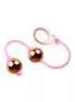Rocks Off Golden Balls with two shiny golden balls connected by a pink silicone string and a looped handle.