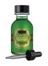Kama Sutra Oil of Love kissable body oil in a green glass bottle with a black dropper, 22ml size.