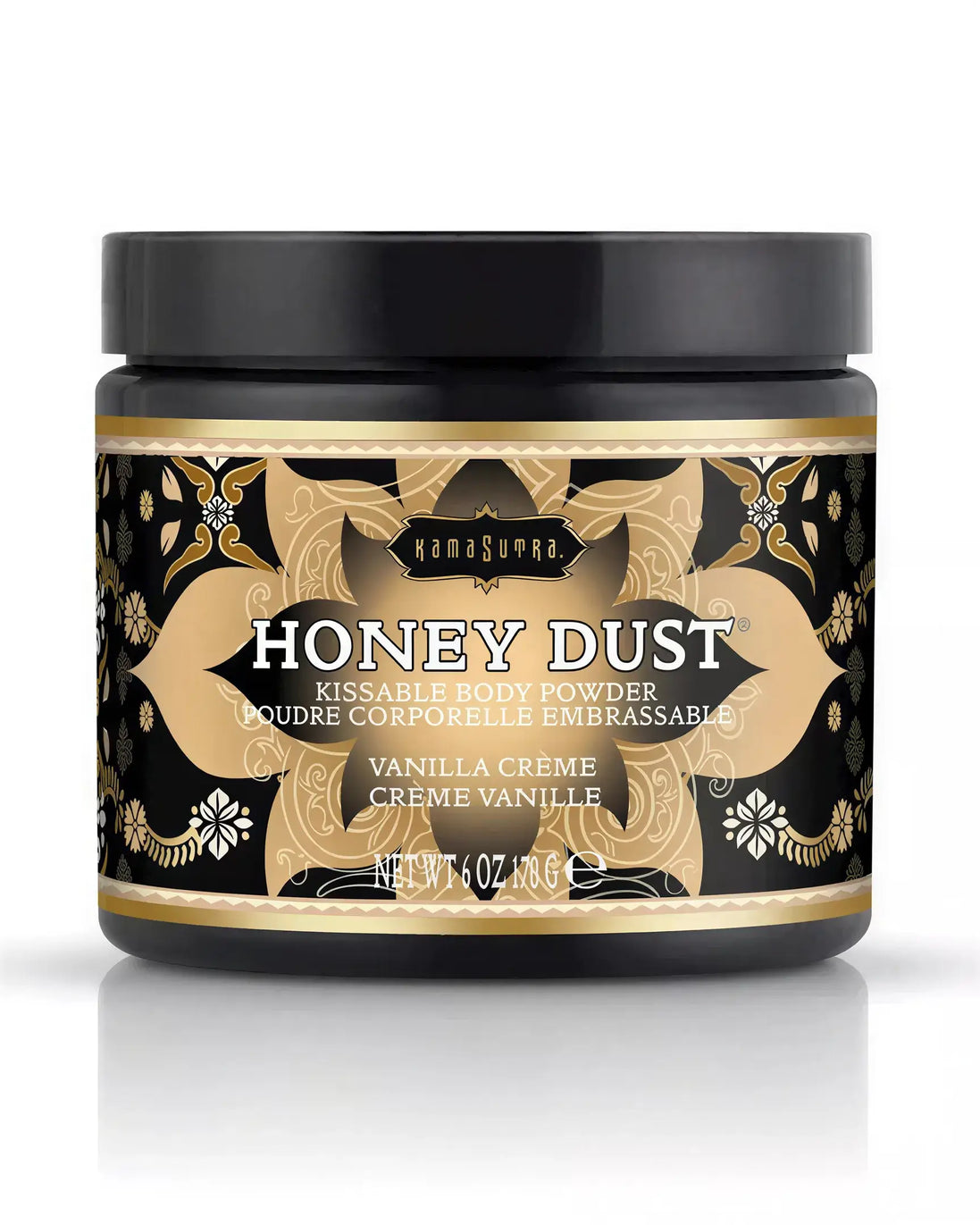Kama Sutra Honey Dust kissable body powder in vanilla crème, 170g jar with ornate black and gold packaging.