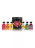 Kama Sutra Oil of Love set with six 22ml bottles in various colors, displayed in a black tin container.