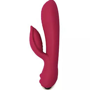 Rocks Off Every Girl vibrator in a deep pink color, held in a hand, featuring a curved design and textured surface.
