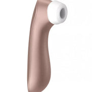 Satisfyer Pro 2 Plus in rose gold with a white silicone tip, angled for ergonomic use.