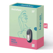 Satisfyer Layons - Dark Desire packaging featuring a sleek design with a black vibrator and pastel green and pink colors.