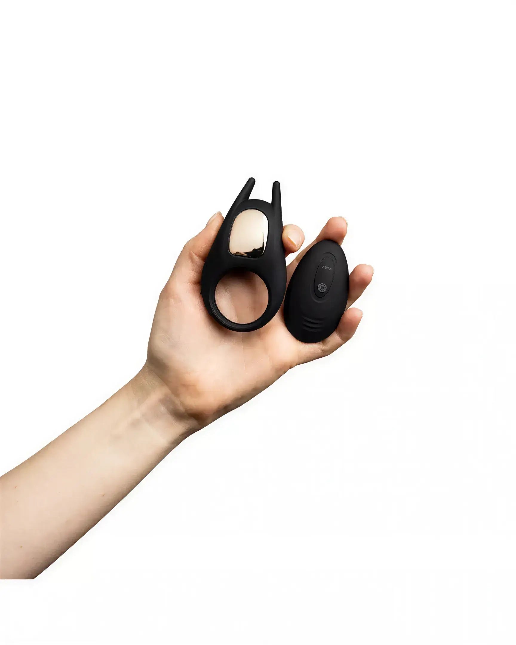 Share Satisfaction Dash II remote control vibrating cock ring held in a hand, featuring a sleek black design and ergonomic...