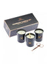 Share Satisfaction massage candle set with three black candles, a gold logo, and a pair of scissors in a gift box.
