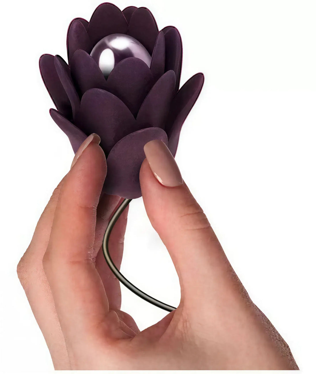Rocks Off Zinnia vibrator held in a hand, featuring a purple flower design with a pearl-like center.