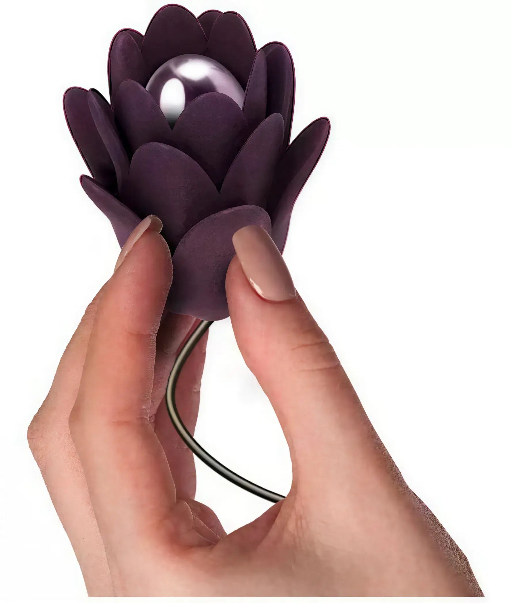 Rocks Off Zinnia vibrator held in a hand, featuring a purple flower design with a pearl-like center.