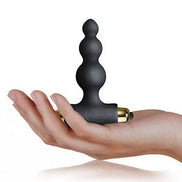 Rocks Off Silhouette Dark Desires Be Mine Kit, featuring a black silicone massager held in a hand.