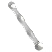 Lucent bagged clear glass massager with a smooth, elongated design and rounded ends for targeted relief.