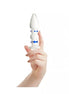 Lucent Duo glass butt plug held in a hand, featuring a white and blue design with a tapered tip and bulbous body.
