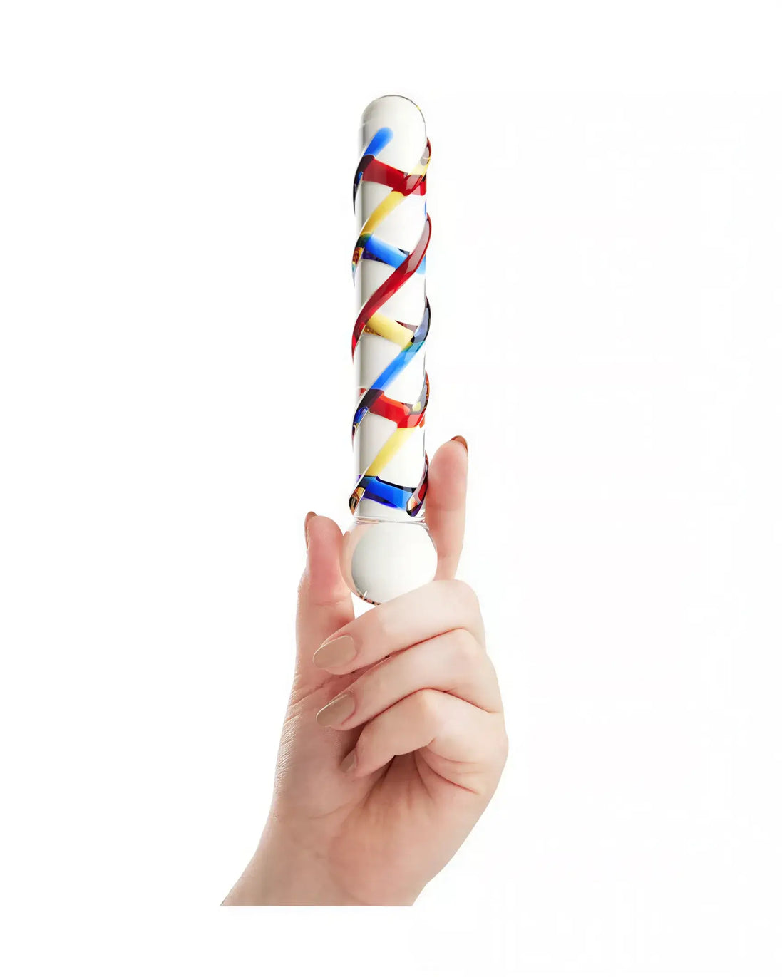 Lucent Trinity textured glass massager held in a hand, featuring a spiral design with red, blue, and yellow accents.