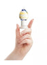 Lucent Prima glass butt plug held in a hand, featuring a colorful striped design and a clear base.