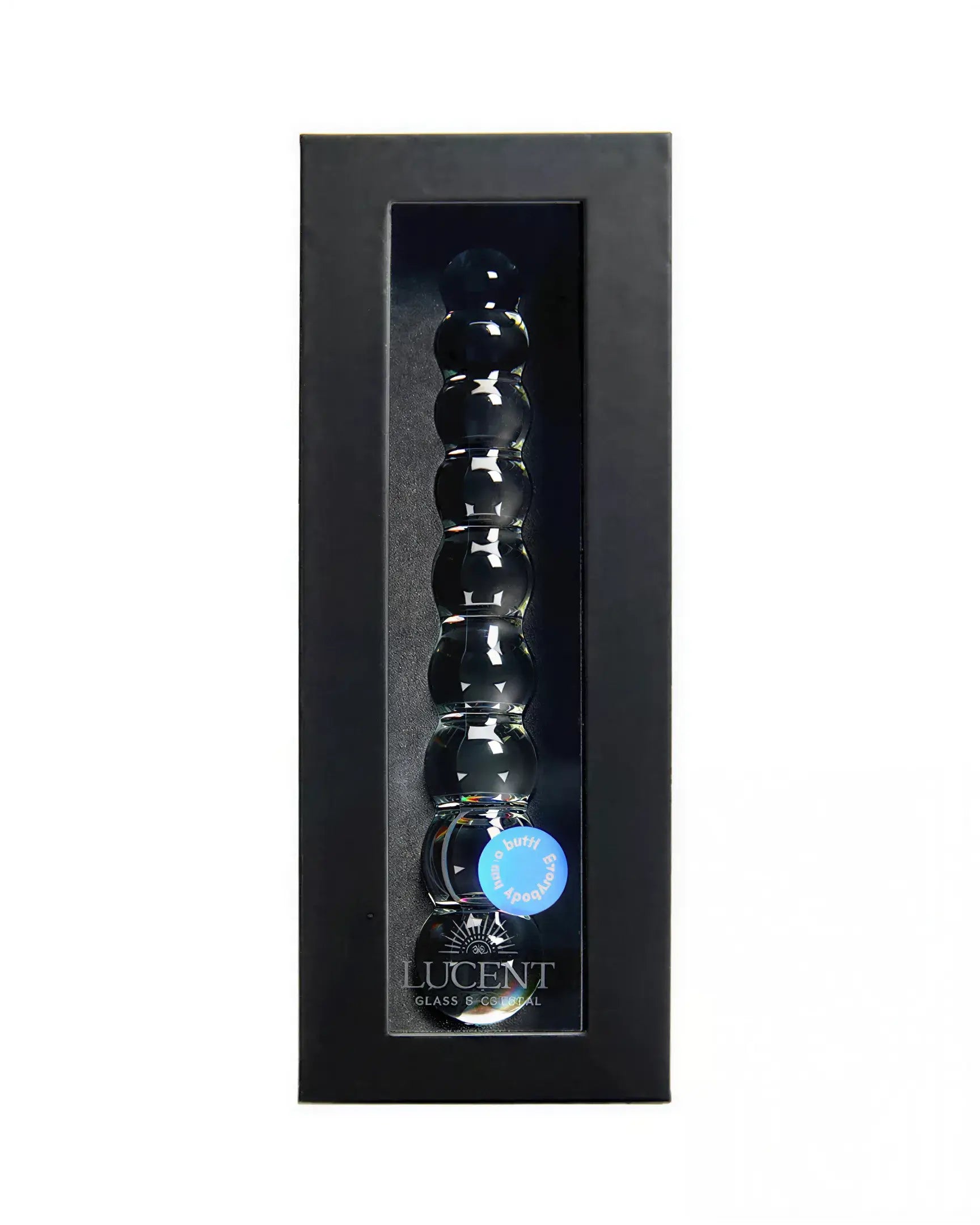 Lucent Celeste beaded glass wand in a black box with a clear window, featuring round glass beads and a label.