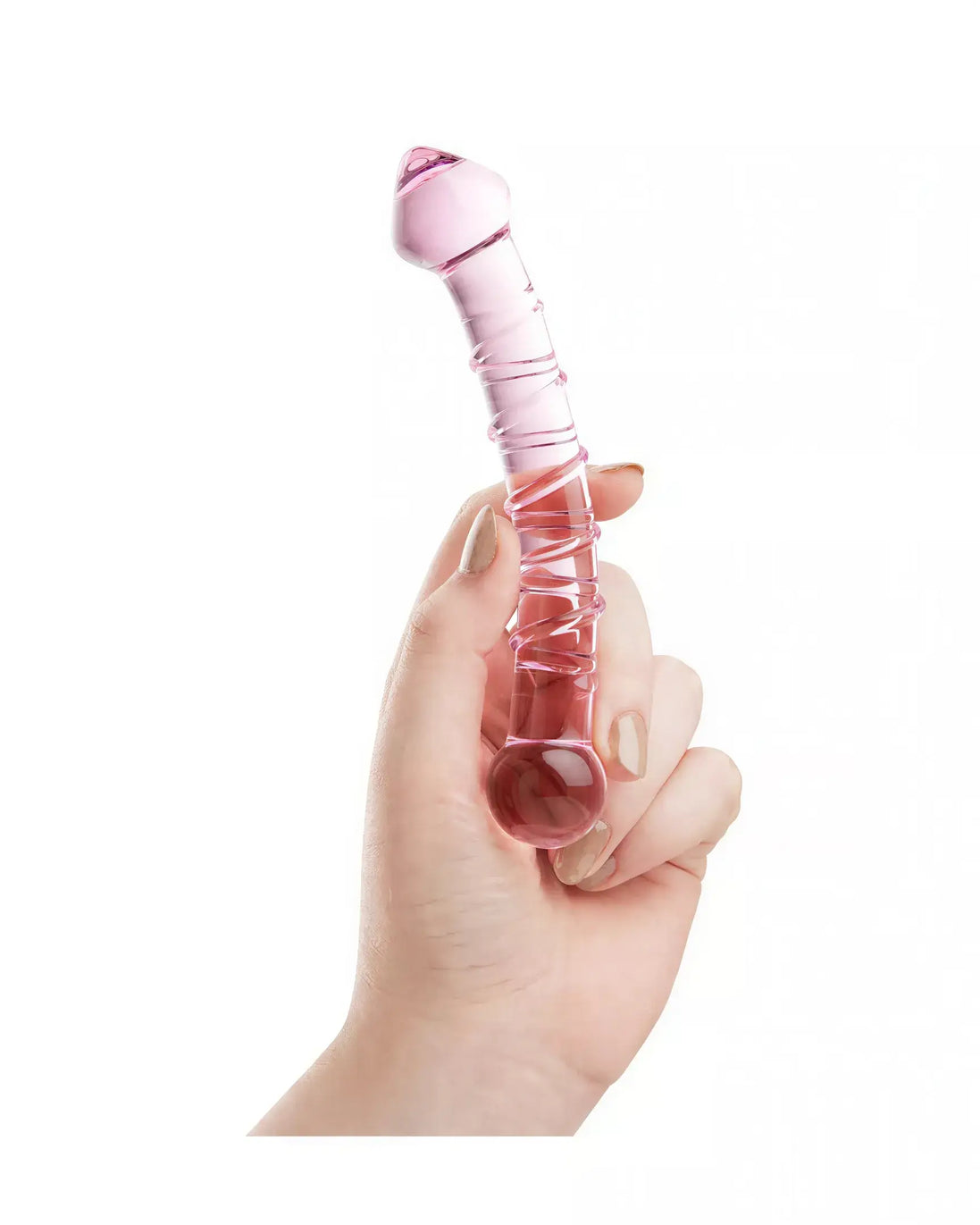 Lucent whirls glass massager held in a hand, featuring a pink gradient and textured surface for enhanced grip.