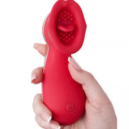 Chakra luxury tongue vibrator in red, held in a hand, featuring a textured tip for stimulation.