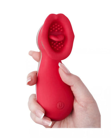 Chakra luxury tongue vibrator in red, held in a hand, featuring a textured tip for stimulation.