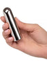 Cal Exotics Glam Bullet in a hand, featuring a sleek, shiny metallic design.