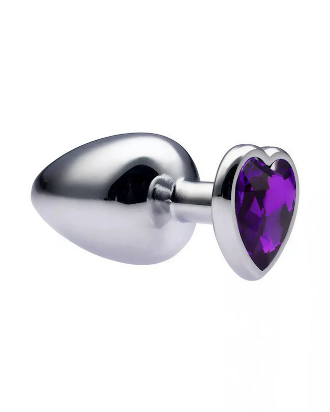 Alloy love heart gemmed butt plug with a shiny silver finish and a purple heart-shaped gem at the base, measuring 3.7 inches.