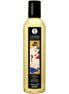 Shunga Amour sweet lotus massage oil in a clear bottle with a black label featuring a couple in an intimate pose.