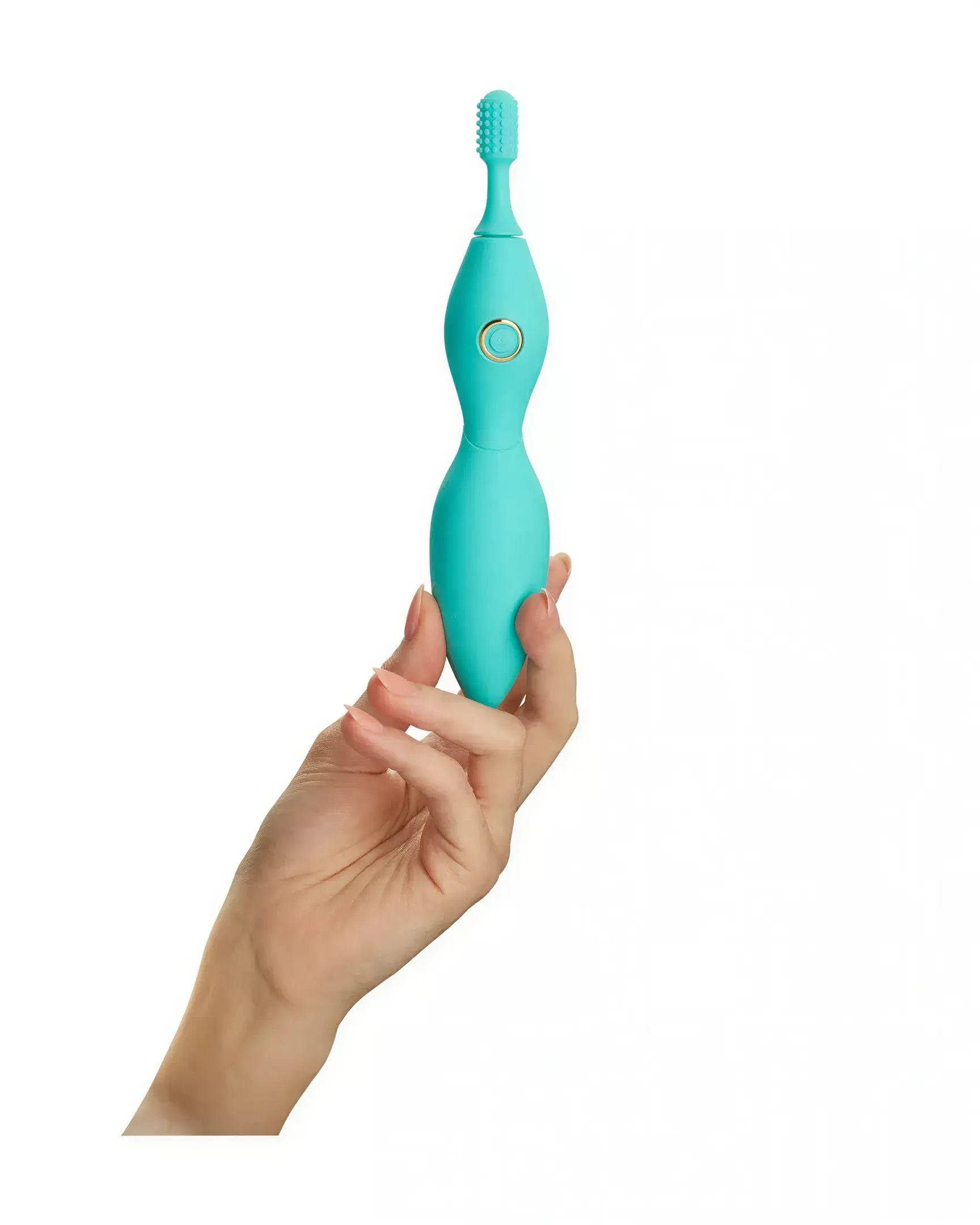 Tanda clitoral vibrator in teal, held in a hand, featuring a textured tip and a central control button.