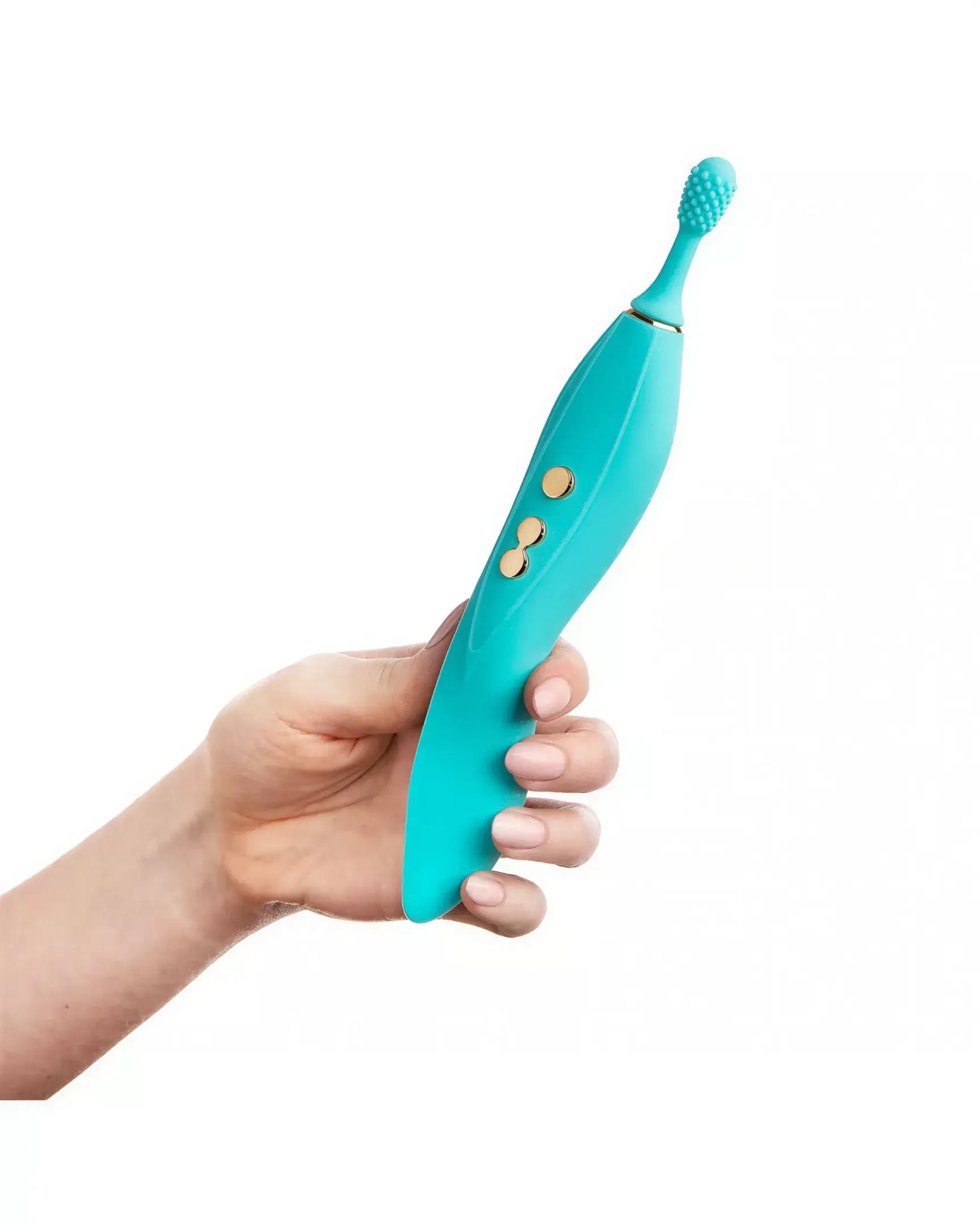 Thana clitoral vibrator in teal held by a hand, featuring a textured tip and control buttons.