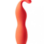 Ceba clitoral vibrator in a vibrant orange color with a curved design, featuring a smooth silicone texture.