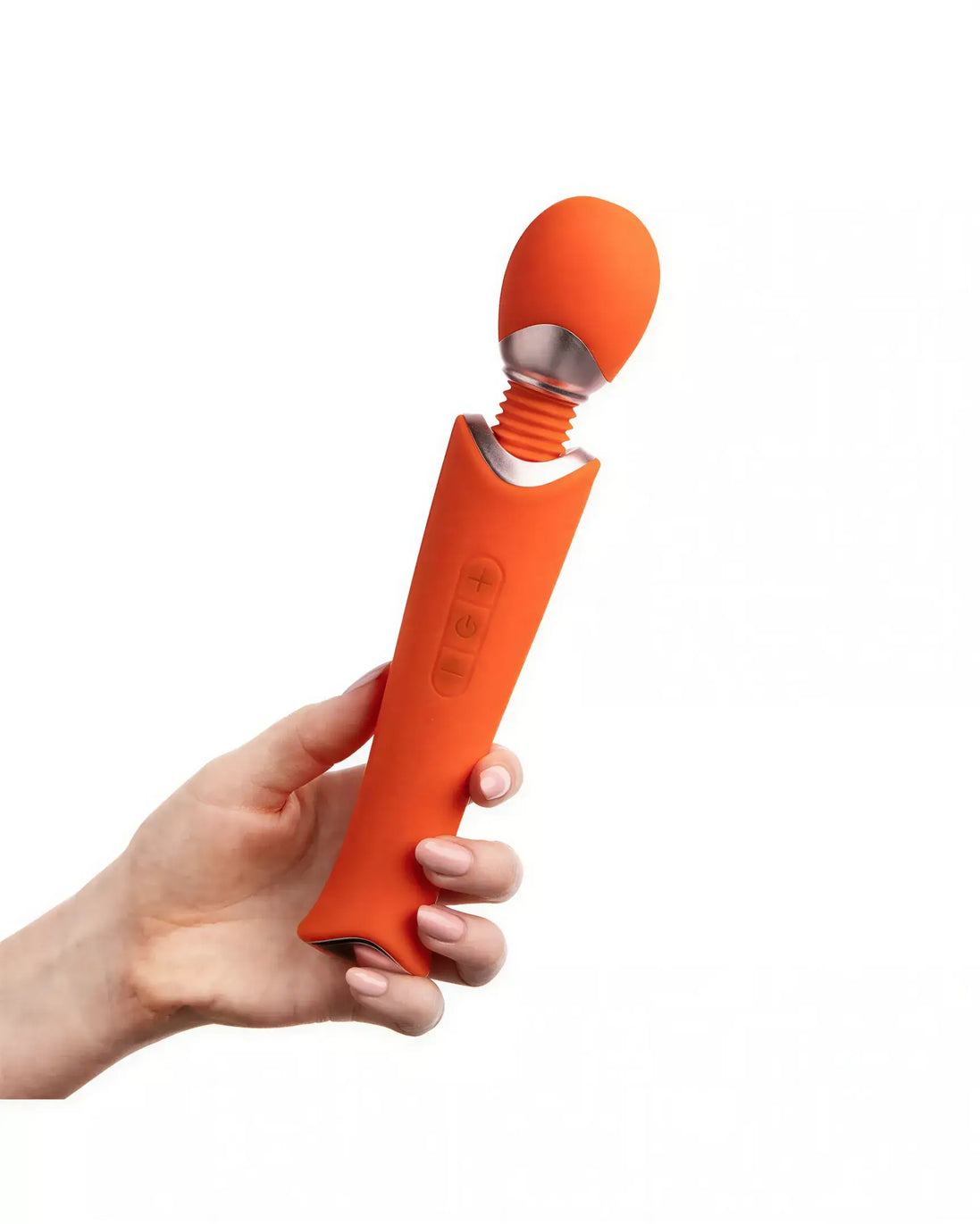 Zarina luxury wand vibrator in orange, held by a hand, featuring a smooth silicone body and control buttons.