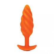B-Vibe swirl texture plug in bright orange with a tapered design and textured surface for enhanced stimulation.
