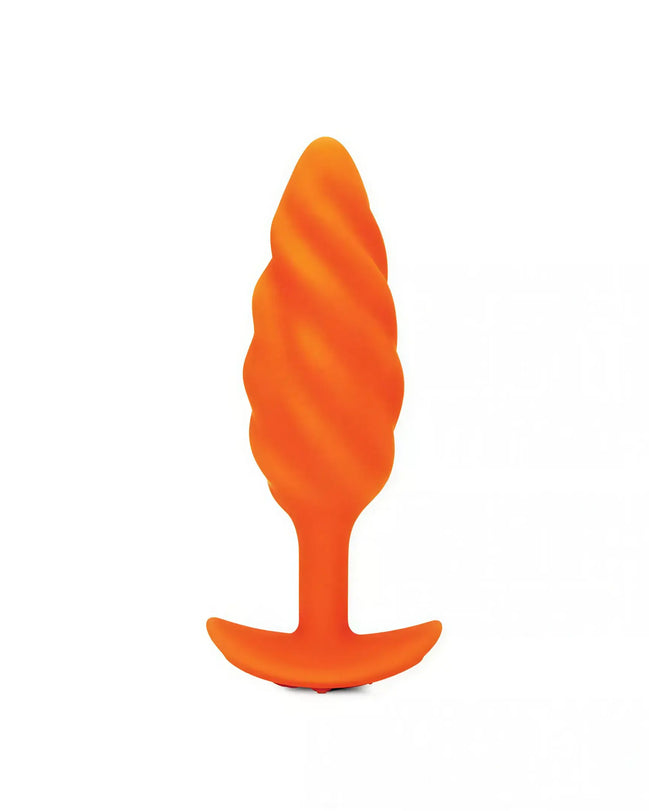 B-Vibe swirl texture plug in bright orange with a tapered design and textured surface for enhanced stimulation.