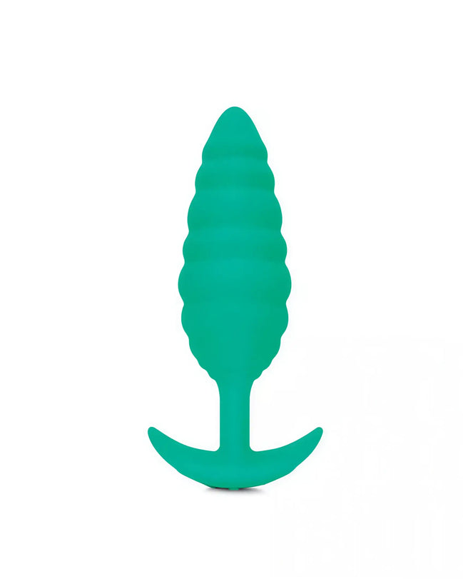 B-Vibe Twist Texture Plug in teal, featuring a ribbed design and a flared base for stability.