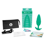 B-Vibe Twist Texture Plug in teal with packaging, storage bag, and instructional materials displayed.