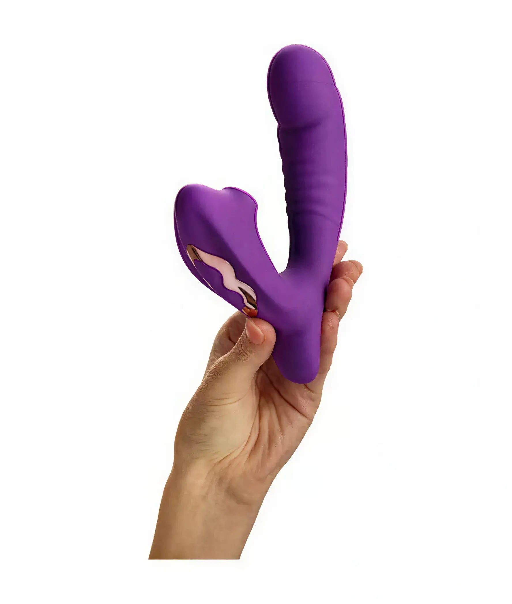 Purple silicone rabbit vibrator held in a hand, featuring a curved design and textured grip.
