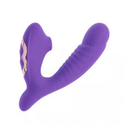 Purple silicone vibrator with a curved design and textured grip, featuring a gold accent on the side.