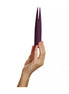 Share Satisfaction Deux in a deep purple color, held in a hand, featuring a sleek, elongated design with pointed ends.