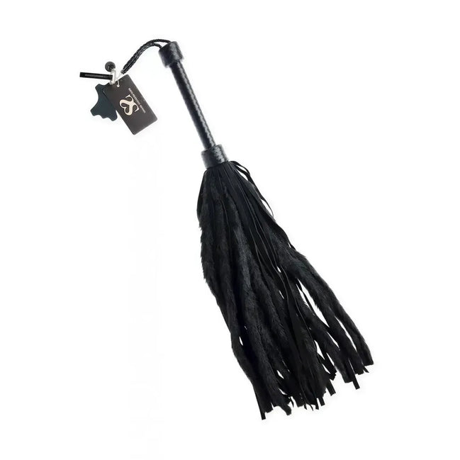 Black lambskin and faux fur flogger with long, textured tassels and a sturdy handle.