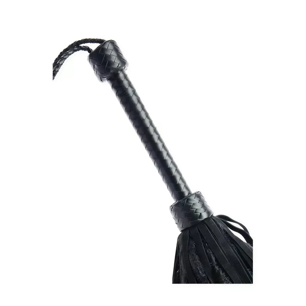 Black lambskin and faux fur flogger with a braided handle and long, soft tassels.