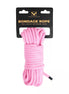 Pink 10 metre luxury bondage rope with a metal head, packaged with a black label displaying the brand name.