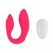 Pink remote-controlled couples vibrator with a sleek design and a white control panel.