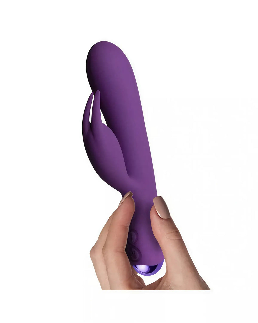 Rocks Off Flutter Rabbit 7-inch vibrator in purple, held by a hand, featuring a curved design and dual stimulation arms.